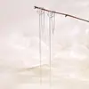 Pendiente colgante de gato antiguo con borla, clip largo para la oreja sin agujero, personalidad temperamental de Corea del Sur, textura, clip para la oreja de rama cruzada, aretes