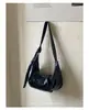 2026 Diseño de Nicho Bolso Plegado para Viajes Diarios Nuevo Bolso Cruzado Elegante Sensación de Alta Gama Color Sólido PU Bolso de Albóndiga de Moda