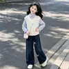 2026 Versión coreana estilo universitario dulce lazo conjunto de sudadera de dos piezas falsas moda personalidad Gato KT jeans conjunto de dos piezas