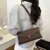 Cross2026 Primavera Novo Estilo Bolsa Transversal Popular Feminina de Ombro Único Sob o Braço Bolsa de Textura Simples Baguete Moda Versátil