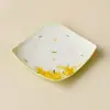 Posavasos de cerámica hechos en fábrica con patrones florales dorados, portavasos de té, accesorios para juegos de té, tapetes resistentes al calor y platos para bocadillos estilo chino para uso doméstico