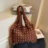 Bolsa de Tricô Grande Capacidade Estilo Relaxado Transfronteiriço para Mulheres 2026 Novo Modelo Bolsa de Ombro Versátil Bolsa Tote para Estudante Universitário