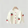 Conjunto de Dos Piezas de Suéter y Falda para Niñas 2026 Nuevo Set de Punto de Cereza y Falda a Cuadros para Primavera y Otoño