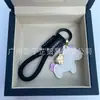 Dinero en el Caballo Cuero de Vaca Creativo Exquisito Casual Regalo de Pareja Bolso Lindo Colgante Llavero de Coche Llavero