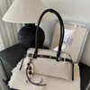 Colección de otoño 2026 transfronteriza: bolso de hombro retro, de alta calidad, con textura, diseño simple de bloques de color, bolso de mano/bolso de axila casual y versátil