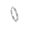 Anillos de pareja estilo Sur de China de plata pura s999 al por mayor, simples y de alta gama, anillos de diseño texturizado creativo de nicho