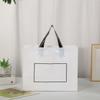 Bolsa tote de plástico en blanco personalizada bolsa para tienda de ropa venta al por mayor portátil bolsa de plástico para compras impresa personalizada