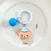 Lindo llavero de oso de pijama de dibujos animados, colgante para bolso girly estilo crema, anillo redondo pintado con decoración de campanita pequeña