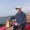 Camisa de manga larga para hombre 2022 primavera y otoño casual holgada trabajo abrigo fino estilo coreano versátil ins top de color liso