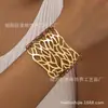 1 pieza directa de fábrica transfronteriza Europa, América y Oriente Medio exagerado Joker retro hueco de hierro forjado pulsera para mujer