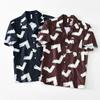 2089 Camisa retro hawaiana de cuello cubano casual nicho alta gama manga corta una generación de pelo