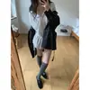 Enviado. Camisa de color liso, plisada, de manga larga y con lazada frontal estilo coreano para mujer, colección otoño 2026, corte holgado y efecto adelgazante