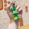 Chaveiro de brinquedo de cobra elfo que brilha e faz barulho atacado presente chaveiro de mochila acessórios de pingente pequeno chaveiro ins
