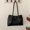 Bolso de moda para mujer con patrón tejido europeo y americano transfronterizo 2026 simple y elegante para el trabajo y el trayecto, con textura, de hombro, bajo el brazo, tipo tote