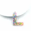 Colgante de resina con forma de letra de lentejuelas rosas, con pegamento, para llavero con letras en inglés, accesorios para bolso