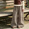 Top Versátil de Manga Larga con Bloques de Color Brillantes Nuevo Otoño 2026 para Niñas Estampado de Leopardo Holgado Moda Elegante