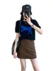 Estilo retro que hace que las piernas se vean más largas, tela de pana suave y delicada con la piel, silueta en A, tiro alto, forrada, minifalda, H090517