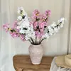 Ins celebridad de internet simulación rama de cerezo de 3 horquillas flor artificial adorno de sala de estar jarrón de suelo arreglo de mesa celebración de boda venta al por mayor transfronterizo