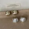 Pendientes Metálicos de Zirconia Estilo Ráfaga de Estrella Cepillados Tipo Frijol de Lujo Ligero y de Gama Alta para Mujer Moda Elegante de Nicho Pendientes de Moda
