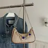 Bolso de Mano para Mujer 2026 Primavera Nuevo de Moda con Cadena de Perlas y Conchas, Tejido Versátil y Texturizado, Bolso de Hombro