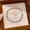 Pulsera con Cierre de Flor de Circonita Chapada en Oro Real de 18k Sentido del Diseño Pulsera de Nicho Lujo Ligero Sensación de Alta Gama Pulsera Retro