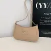 Bolso de axila de diseño de nicho casual para mujer, nuevo bolso de mano y bandolera elegante y moderno para la primavera de 2026