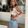 Ins estilo europeo y americano transfronterizo 2026 nueva moda elegante para mujer al por mayor para ir al trabajo cuello redondo holgado chaleco top bordado