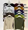 Otoño 2026 Estilo Coreano Cuello en V Manga Larga Camiseta Interior para Mujer Sensación de Alta Gama Adelgazante Favorecedora Ropa Interior Elegante Tendencia Reductora de Edad Top