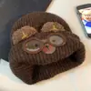 Bonito gorro de punto con orejas de gato para mujer, perfecto para otoño e invierno, te mantiene abrigada y hace que tu cara se vea más pequeña. Presenta ojos de gato de dibujos animados y orejeras