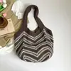 Bolso de Hombro Individual Calado Tejido para Mujer Primavera 2026 Nuevo Bolso Tejido Rayado Casual de Gran Capacidad para Vacaciones en la Playa Estilo Simple
