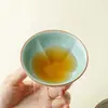 La Taza Maestra Fulu del Horno Ru Iroki, una taza de té de cerámica de alta gama, se puede usar para cultivar patrones de craquelado; una sola taza personalizada de porcelana Ru con forma de calabaza