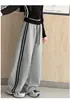 Calça de Moletom Feminina Primavera e Outono 2026 Nova Casual Menina Estilo Coreano Crianças Médias e Grandes Calça Esportiva de Perna Reta Listrada Tendência Transfronteiriça