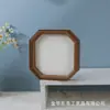 Novo ornamento de porta-retrato octogonal oco estilo chinês, suporte de exibição de caligrafia e pintura em madeira, moldura de exibição octogonal de formato irregular montada na parede, moldura decorativa