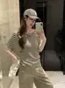 Tiro real~Suéter de punto con cuello de volante estilo minimalista coreano para mujer 2026 nueva llegada manga murciélago acanalado holgado top 11428