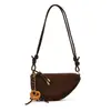 Bolso de textura de alto valor para mujer, gran capacidad, otoño 2026, estilo nuevo simple, nicho retro, bolso cruzado, bolso dumpling para mujer