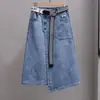 Talla grande verano irregular A- línea falda adelgazante moda cintura elástica falda de mezclilla combinable falda midi moderna para mujer