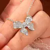 Lindo collar con colgante de moissanita en forma de lazo totalmente adornado para mujer, deslumbrante cadena para la clavícula de diseño único, popular en Xiaohongshu