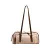 Bolsa de Mão de Boliche Nova Retro Outono 2026 Bolsa de Ombro Grande Capacidade Feminina Tendência Nicho Versátil Bolsa de Axila