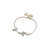 Pulseira Borboleta de Zircônia Banhada a Ouro Real com Madrepérola Moda Coreana Pulseira de Temperamento Joias de Luxo Leve de Alta Qualidade para Mulheres Venda por Atacado