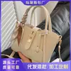 Bolso de nicho para mujer 2022 nuevo de moda otoño e invierno cesta de verduras para mujer estilo Chanel bolso de mensajero bolso cubo portátil