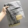 Jeans Cortos Vintage con Parche Roto Marca de Moda para Hombre Corte Slim Fit Cónico Estilo Primavera/Otoño Pantalones Casuales Impresos Rebelde Genial