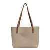 Bolso tote de gran capacidad para mujer, adecuado para otoño e invierno, para ir al trabajo y uso casual, con una sensación de calidad, nuevo bolso de hombro versátil y simple para la clase 2026
