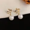 Aretes de borla de perlas florales estilo francés para mujer, únicos y elegantes, aretes de lujo ligero de alta gama, al por mayor