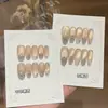 Un par de puntas de uña Gu [Jinsha] en tono dorado, otoñales y atmosféricas, estilo ojo de gato, con detalles de diamantes triturados y purpurina fina, hechas a mano