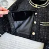 Conjunto de chaqueta y falda de tweed con lentejuelas negras para niña, nuevo estilo otoño 2026, conjunto de dos piezas con falda midi elástica de línea A