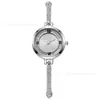 Reloj de mujer transfronterizo con esfera redonda pequeña adornada con diamantes, de estilo preppy y diseño elegante, y una cómoda pulsera extensible.
