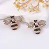 Pendientes de aleación con diseño simple de lujo ligero, moda exquisita transfronteriza, pendientes de abeja de insecto totalmente engastados con diamantes, pendientes diarios versátiles para mujer