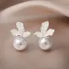 Aretes de Flor de Iris Aguja de Plata Perla Cristal Elegantes de Lujo Ligero Nuevos Únicos Suministro Transfronterizo Aretes al por Mayor