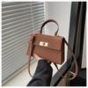 Bolsas de Mano de Moda en Relieve para Mujer 2024 Verano Nuevo Estilo Estilo de Mujer Color Sólido Cierre Giratorio Bolso de Hombro Cruzado