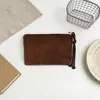 Nova porta-moedas de veludo cotelê com bolinhas, uma bolsa portátil para batom e maquiagem para mulheres, apresentando um design fofo e grande capacidade de armazenamento.